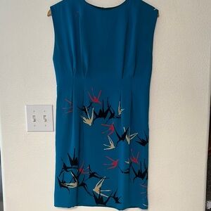 Elegant Teal Sleeveless Dress with Bird Print